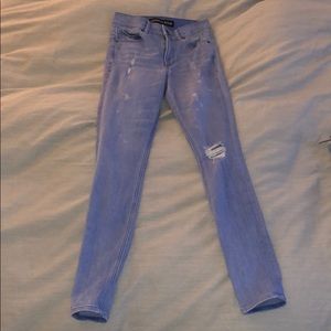 High rise ripped jegging